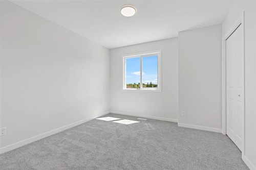 12 Park Lane, Didsbury, AB - Indoor Photo Showing Other Room