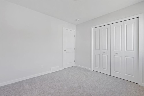 12 Park Lane, Didsbury, AB - Indoor Photo Showing Other Room