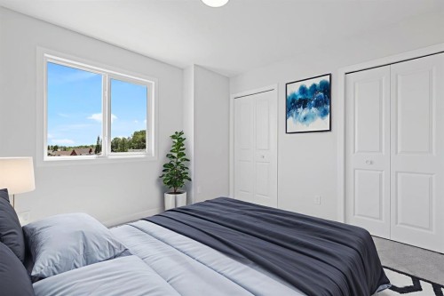 11 Park Lane, Didsbury, AB - Indoor Photo Showing Bedroom