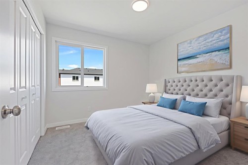 11 Park Lane, Didsbury, AB - Indoor Photo Showing Bedroom