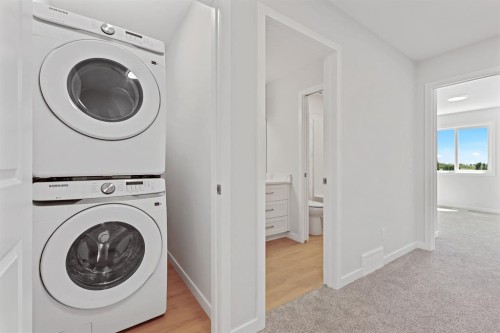 11 Park Lane, Didsbury, AB - Indoor Photo Showing Laundry Room