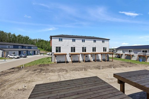 11 Park Lane, Didsbury, AB - Outdoor With Deck Patio Veranda