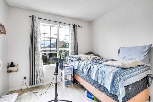 19 Taravista Gardens Ne, Calgary, AB - Indoor Photo Showing Bedroom