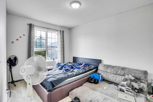 19 Taravista Gardens Ne, Calgary, AB - Indoor Photo Showing Bedroom