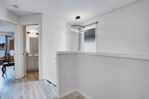 19 Taravista Gardens Ne, Calgary, AB - Indoor Photo Showing Other Room