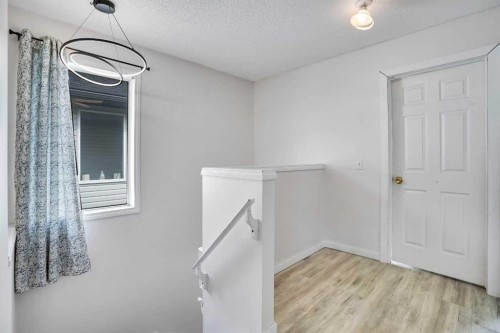 19 Taravista Gardens Ne, Calgary, AB - Indoor Photo Showing Other Room
