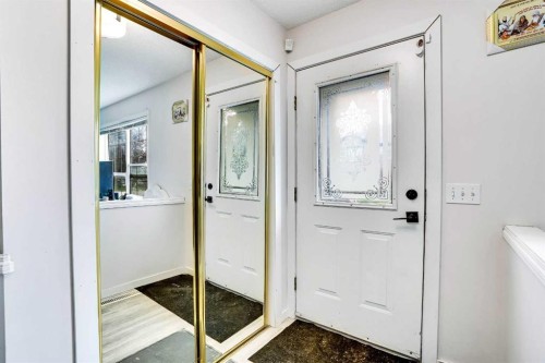 19 Taravista Gardens Ne, Calgary, AB - Indoor Photo Showing Other Room