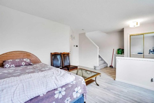 19 Taravista Gardens Ne, Calgary, AB - Indoor Photo Showing Bedroom