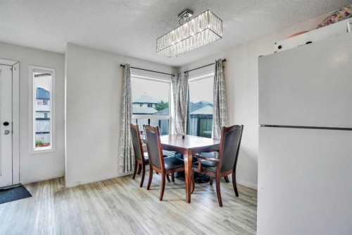 19 Taravista Gardens Ne, Calgary, AB - Indoor Photo Showing Dining Room