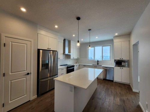 575 Lucas Boulevard Nw, Calgary, AB - Indoor Photo Showing Kitchen With Stainless Steel Kitchen With Upgraded Kitchen
