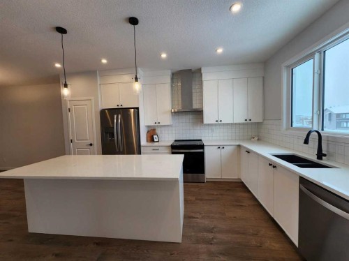 575 Lucas Boulevard Nw, Calgary, AB - Indoor Photo Showing Kitchen With Stainless Steel Kitchen With Double Sink With Upgraded Kitchen