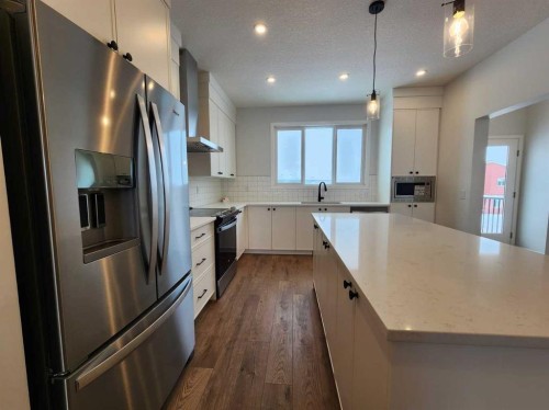 575 Lucas Boulevard Nw, Calgary, AB - Indoor Photo Showing Kitchen With Stainless Steel Kitchen With Upgraded Kitchen