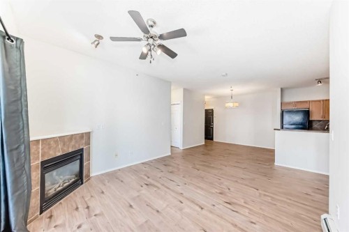 5311-70 Panamount Drive Nw, Calgary, AB - Indoor With Fireplace