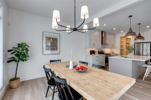 483 Rivercrest View, Cochrane, AB - Indoor Photo Showing Dining Room