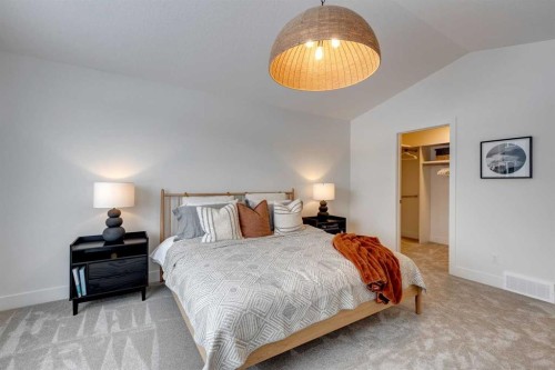 483 Rivercrest View, Cochrane, AB - Indoor Photo Showing Bedroom