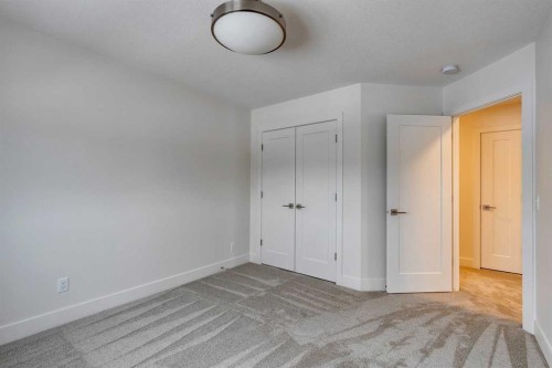 483 Rivercrest View, Cochrane, AB - Indoor Photo Showing Other Room