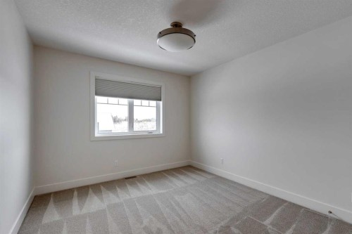 483 Rivercrest View, Cochrane, AB - Indoor Photo Showing Other Room