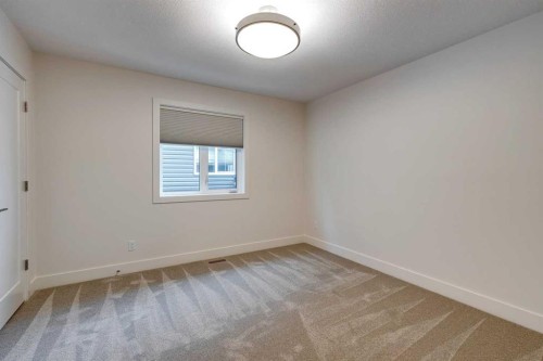 483 Rivercrest View, Cochrane, AB - Indoor Photo Showing Other Room