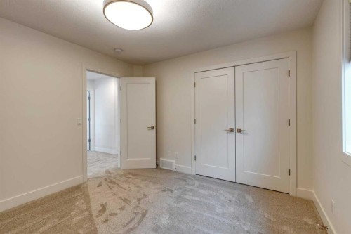 483 Rivercrest View, Cochrane, AB - Indoor Photo Showing Other Room