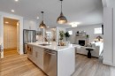483 Rivercrest View, Cochrane, AB  - Indoor Photo Showing Kitchen With Stainless Steel Kitchen With Upgraded Kitchen 