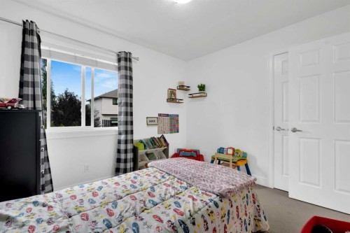 2020 Windsong Drive Sw, Airdrie, AB - Indoor Photo Showing Bedroom