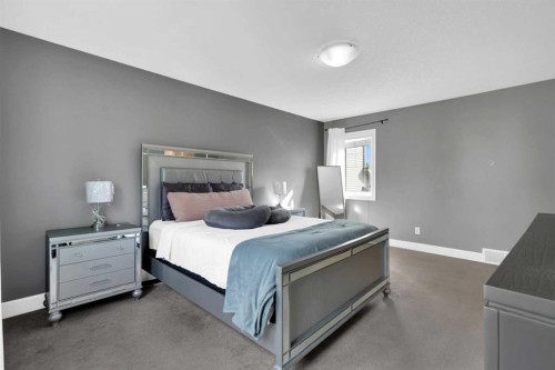 2020 Windsong Drive Sw, Airdrie, AB - Indoor Photo Showing Bedroom