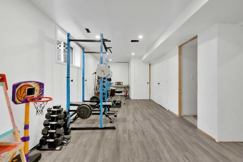 2020 Windsong Drive Sw, Airdrie, AB - Indoor Photo Showing Gym Room
