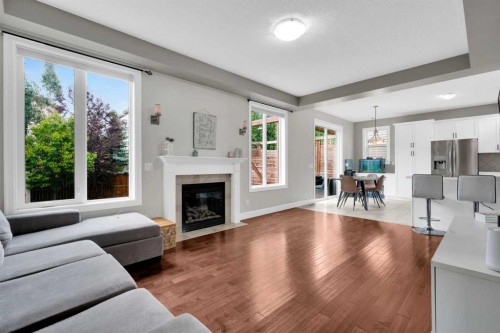 2020 Windsong Drive Sw, Airdrie, AB - Indoor Photo Showing Living Room With Fireplace