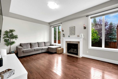 2020 Windsong Drive Sw, Airdrie, AB - Indoor Photo Showing Living Room With Fireplace