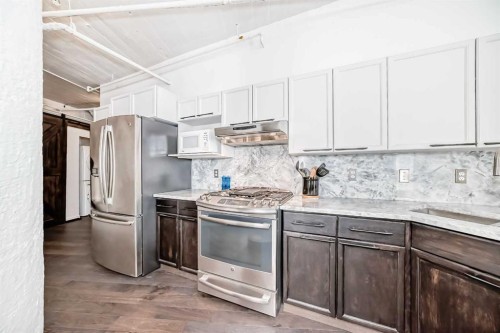 402-240 11 Avenue Sw, Calgary, AB - Indoor Photo Showing Kitchen With Stainless Steel Kitchen With Upgraded Kitchen