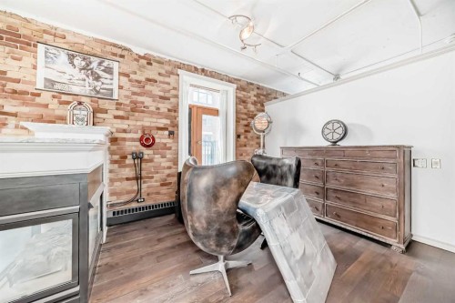 402-240 11 Avenue Sw, Calgary, AB - Indoor With Fireplace