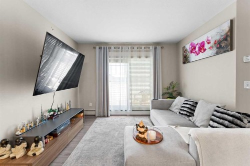3407-11 Mahogany Row Se, Calgary, AB - Indoor Photo Showing Living Room