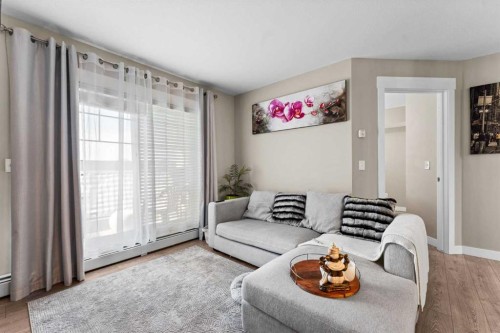 3407-11 Mahogany Row Se, Calgary, AB - Indoor Photo Showing Living Room