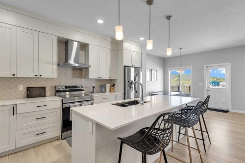 672 Walgrove Boulevard Se, Calgary, AB - Indoor Photo Showing Kitchen With Double Sink With Upgraded Kitchen