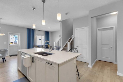 672 Walgrove Boulevard Se, Calgary, AB - Indoor Photo Showing Kitchen With Double Sink With Upgraded Kitchen