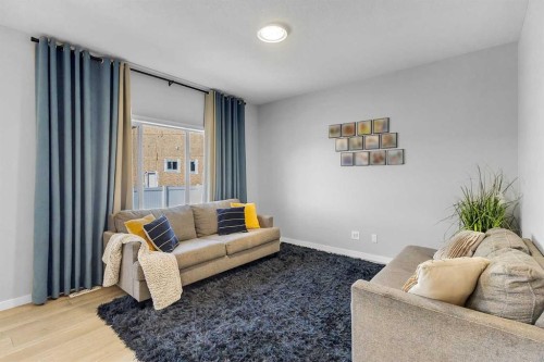 672 Walgrove Boulevard Se, Calgary, AB - Indoor Photo Showing Living Room
