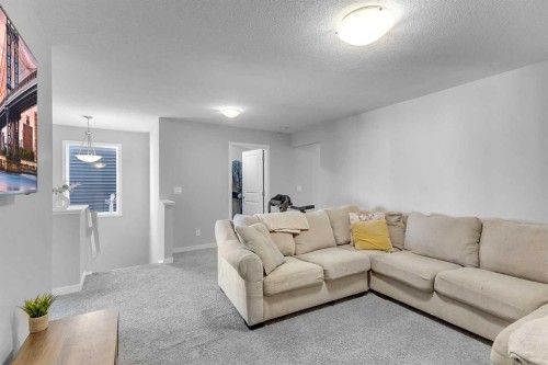 672 Walgrove Boulevard Se, Calgary, AB - Indoor Photo Showing Living Room