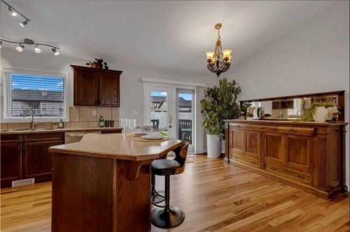 3 Liberty Place, Sylvan Lake, AB - Indoor Photo Showing Kitchen With Double Sink