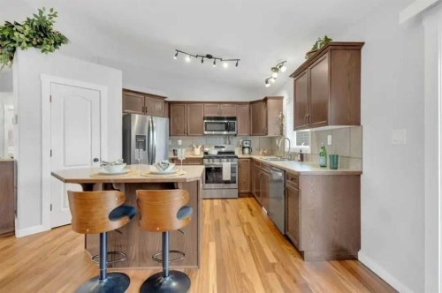 3 Liberty Place, Sylvan Lake, AB - Indoor Photo Showing Kitchen With Stainless Steel Kitchen