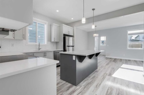 461 South Point Glen Sw, Airdrie, AB - Indoor Photo Showing Kitchen With Upgraded Kitchen