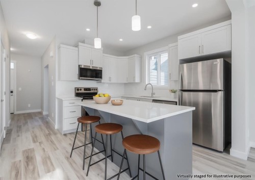 461 South Point Glen Sw, Airdrie, AB - Indoor Photo Showing Kitchen With Upgraded Kitchen