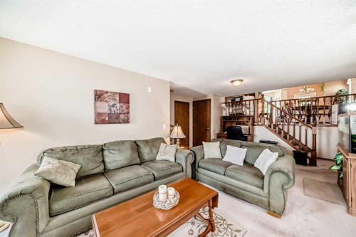 76 Hidden Way Nw, Calgary, AB - Indoor Photo Showing Living Room