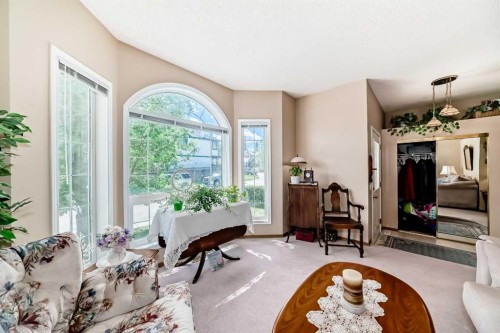 76 Hidden Way Nw, Calgary, AB - Indoor Photo Showing Living Room