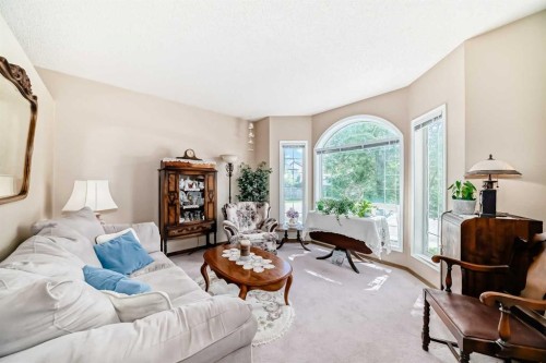 76 Hidden Way Nw, Calgary, AB - Indoor Photo Showing Living Room
