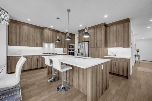 198 Kinniburgh Crescent, Chestermere, AB - Indoor Photo Showing Kitchen With Upgraded Kitchen