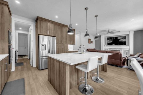 198 Kinniburgh Crescent, Chestermere, AB - Indoor Photo Showing Kitchen With Upgraded Kitchen