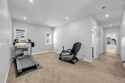 198 Kinniburgh Crescent, Chestermere, AB - Indoor Photo Showing Gym Room