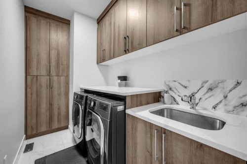 198 Kinniburgh Crescent, Chestermere, AB - Indoor Photo Showing Laundry Room