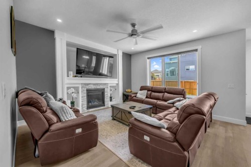 198 Kinniburgh Crescent, Chestermere, AB - Indoor Photo Showing Living Room With Fireplace