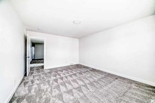 2 Appaloosa Way, Cochrane, AB - Indoor Photo Showing Other Room